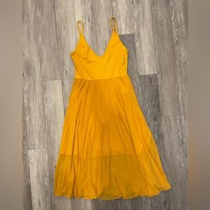 Wilfred thong body suite dress with pleated skirt